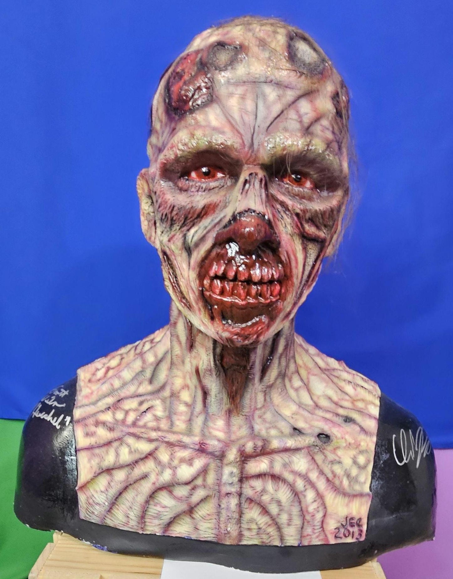 The Walking Dead inspired walker bust signed by 2 actors.