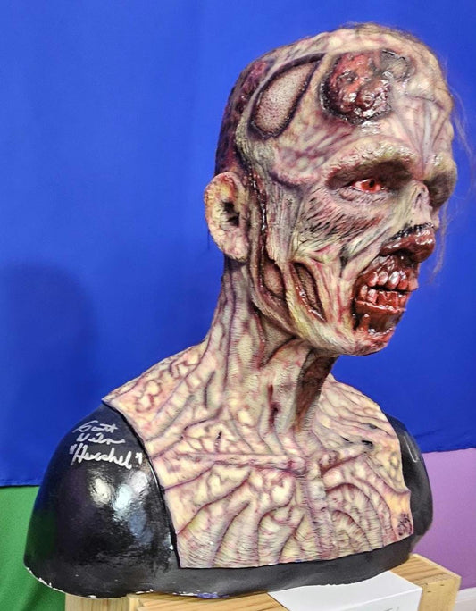 The Walking Dead inspired walker bust signed by 2 actors.